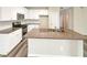 Modern kitchen with granite countertops and stainless steel appliances at 1054 Valley Rock Dr, Lithonia, GA 30058