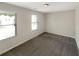 Spacious bedroom with neutral walls and carpet flooring at 1054 Valley Rock Dr, Lithonia, GA 30058