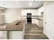Modern kitchen with granite countertops and island at 1054 Valley Rock Dr, Lithonia, GA 30058