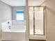 Updated bathroom with a large soaking tub and a separate shower at 1054 Valley Rock Dr, Lithonia, GA 30058