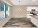 Bright dining area with large windows and hardwood floors at 1054 Valley Rock Dr, Lithonia, GA 30058