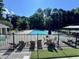 Inviting community pool area with surrounding greenery at 1215 Wandering Vine Ct, Mableton, GA 30126