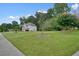 Exterior of a two-story house with a spacious lawn at 1215 Wandering Vine Ct, Mableton, GA 30126