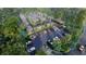 Aerial view of modern homes nestled in a wooded area with parking at 6305 Shannon Pkwy # 100, Union City, GA 30291