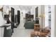 Open concept living area with green sofa and kitchen view at 6305 Shannon Parkway # 206, Union City, GA 30291