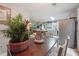 Bright dining area with a wooden table and view of kitchen at 349 Majestic Run, Temple, GA 30179