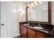 Double vanity bathroom with granite countertop at 131 Bowen Sw Cir, Atlanta, GA 30315