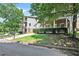Two-story house exterior with a covered porch and driveway at 131 Bowen Sw Cir, Atlanta, GA 30315