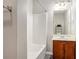 Clean bathroom with a tub shower combo, vanity, and mirror at 131 Bowen Sw Cir, Atlanta, GA 30315