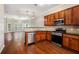 Open kitchen with stainless steel appliances and granite countertops at 131 Bowen Sw Cir, Atlanta, GA 30315