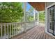 Wooden deck with white railings and access to a door at 131 Bowen Sw Cir, Atlanta, GA 30315