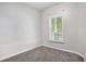 Simple bedroom with neutral walls and carpet flooring at 131 Bowen Sw Cir, Atlanta, GA 30315