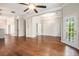 Bright living room featuring hardwood floors and access to a deck at 131 Bowen Sw Cir, Atlanta, GA 30315