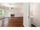 Spacious living room with hardwood floors, fireplace and powder room at 131 Bowen Sw Cir, Atlanta, GA 30315