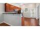 Kitchen with wood cabinets, granite countertops, and stainless steel appliances at 131 Bowen Sw Cir, Atlanta, GA 30315
