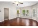 Living room with hardwood floors and sliding glass doors at 131 Bowen Sw Cir, Atlanta, GA 30315