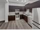Modern kitchen with stainless steel appliances at 745 Fountainhead Ne Ln # 113, Atlanta, GA 30324