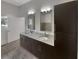 Double vanity bathroom with granite countertops and tile flooring at 745 Fountainhead Ne Ln # 113, Atlanta, GA 30324