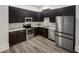 Modern kitchen with stainless steel appliances at 745 Fountainhead Ne Ln # 113, Atlanta, GA 30324