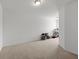 Spacious bonus room with carpeted floor and lots of storage at 2314 Rolling Trl, Lithonia, GA 30058