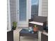 Small patio with wicker furniture set at 2314 Rolling Trl, Lithonia, GA 30058