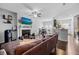 Open concept living room with fireplace and access to kitchen at 2314 Rolling Trl, Lithonia, GA 30058