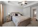 Bright bedroom featuring a comfortable bed and ensuite bathroom at 2314 Rolling Trl, Lithonia, GA 30058