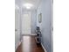 Light and airy entryway with hardwood floors and console table at 2314 Rolling Trl, Lithonia, GA 30058