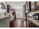 Eat-in kitchen with hardwood floors and ample cabinet space at 2314 Rolling Trl, Lithonia, GA 30058