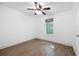 Bright bedroom with ceiling fan and wood flooring at 166 Rustin Dr, Dallas, GA 30157