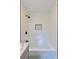 Updated bathroom with a shower/tub combo, marble vanity, and modern fixtures at 6733 Walker Rd, Riverdale, GA 30296