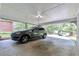 Covered carport with parking for one vehicle at 6733 Walker Rd, Riverdale, GA 30296
