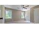 Spacious bedroom with neutral walls and carpet flooring at 6733 Walker Rd, Riverdale, GA 30296