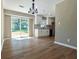 Bright dining area with new flooring and chandelier at 6733 Walker Rd, Riverdale, GA 30296