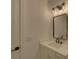 Modern bathroom with white vanity and frameless mirror at 4847 Basingstoke Dr, Suwanee, GA 30024