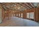 Large unfinished basement with high ceilings and ample natural light at 4847 Basingstoke Dr, Suwanee, GA 30024