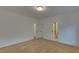 Simple bedroom with carpet flooring, and access to bathroom at 4847 Basingstoke Dr, Suwanee, GA 30024