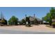 Attractive community entrance with landscaping and a welcoming building at 4847 Basingstoke Dr, Suwanee, GA 30024