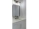 Modern bathroom with white vanity, quartz countertop, and black matte fixtures at 4847 Basingstoke Dr, Suwanee, GA 30024