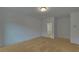 Bright bedroom with neutral carpeting and ensuite bathroom at 4847 Basingstoke Dr, Suwanee, GA 30024