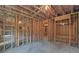 Unfinished basement framed for future rooms and baths at 4847 Basingstoke Dr, Suwanee, GA 30024