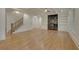 Living room with hardwood floors, fireplace and built in shelving at 4847 Basingstoke Dr, Suwanee, GA 30024