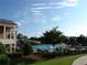 Resort-style pool with a waterslide and plenty of lounge chairs at 4847 Basingstoke Dr, Suwanee, GA 30024