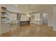 Large kitchen with white cabinets and hardwood floors at 4847 Basingstoke Dr, Suwanee, GA 30024