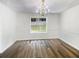 Bright dining room with hardwood floors and a chandelier at 3853 Cress Way Dr, Decatur, GA 30034