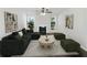 Virtually staged living room with fireplace and modern furniture at 3853 Cress Way Dr, Decatur, GA 30034