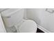 Clean bathroom with a toilet and dark flooring at 3853 Cress Way Dr, Decatur, GA 30034