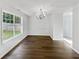 Bright dining room with hardwood floors and chandelier at 3853 Cress Way Dr, Decatur, GA 30034
