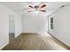 Spacious bedroom with carpeted floors and a ceiling fan at 3853 Cress Way Dr, Decatur, GA 30034