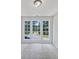 Bright bedroom with gray carpet and large windows at 3853 Cress Way Dr, Decatur, GA 30034